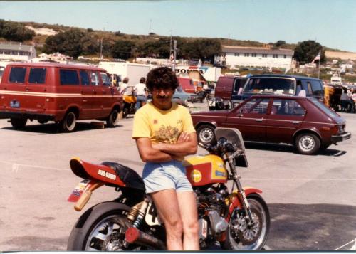 Carry Andrew leaning against “Yancy,” his Kawasaki KZ1000 Superbike, in the Laguna Seca paddock in ’80, the year that he scored an impressive 5th-place finish in the Superbike class, in a field with over 10 factory Superbikes and a hungry pack of fast privateers.