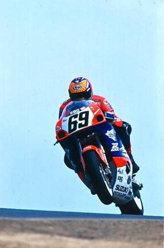 Nicky Hayden, wheelying his HyperCycle Suzuki GSX-R750 over the blind rise into the fast, downhill Carousel at Sears Point International Raceway on his way to another victory in the 750 Supersport race.